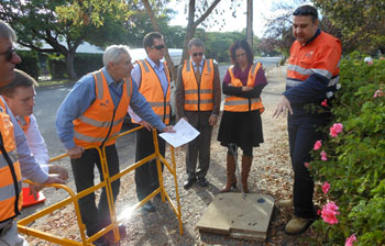 Committee members inspecting pits and pipes with NBN Co, Willunga S.A.